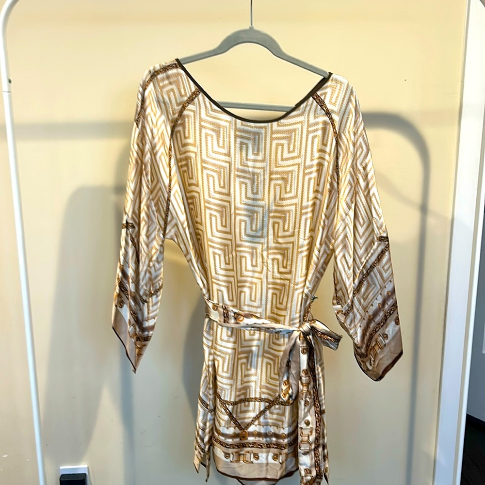 Aum- Couture , silk mini dress with attached belt
Size - Medium
